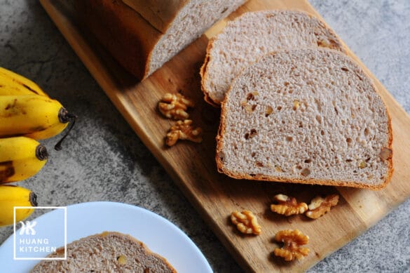 Banana Loaf Bread (Bread Machine) Recipe by Huang Kitchen – Feature Photo of Bread slices with walnuts in background Banana Loaf Bread (Bread Machine) Recipe by Huang Kitchen - Feature Photo of Bread slices with walnuts in background