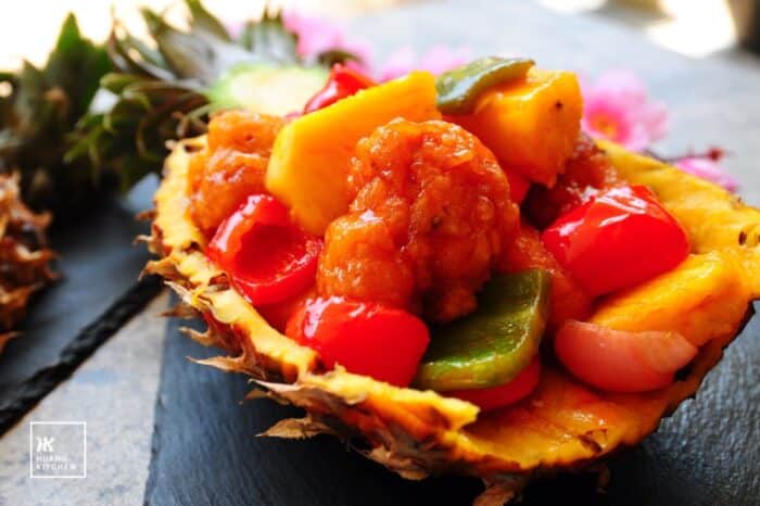 Close up side view of sweet and sour pineapple pork ribs